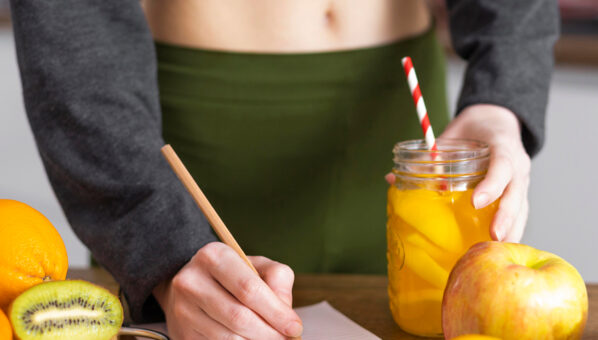close-up-hand-writing-notebook 2